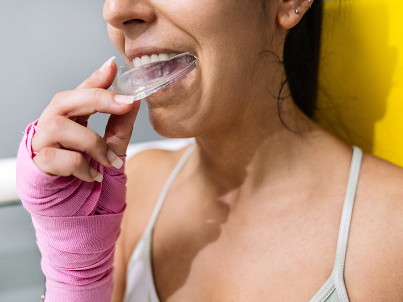 Athlete wearing sports mouth guard Ann Arbor dentists